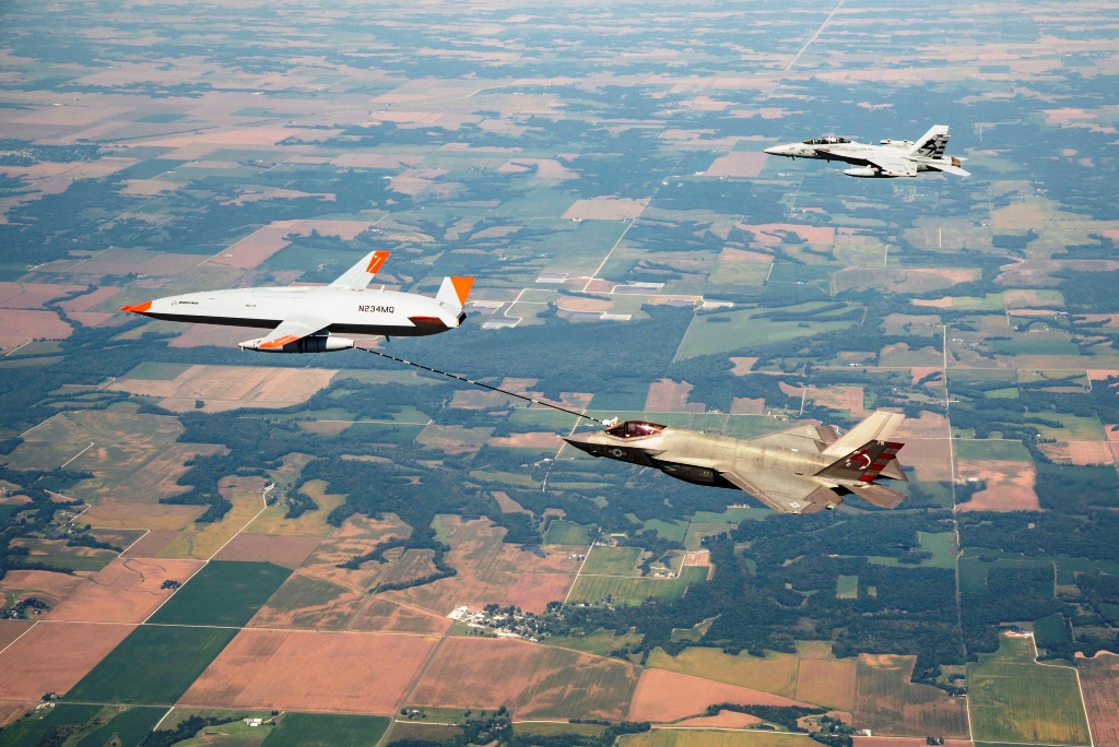 Boeing MQ-25 Stingray aerial refuelling drone refuels a U.S. Navy F-35C Lightning II fighter jet